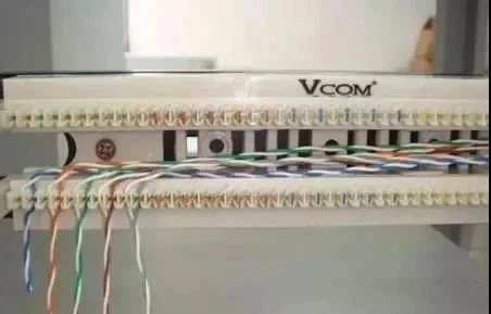 According to the cable color code arrangement, carefully press each color-coded pair into the slots one by one According to the cable color code arrangement, carefully press each color-coded pair into the slots one by one