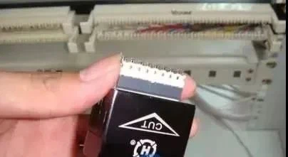 Insert the 110 connecting blocks into the 5-pair punch-down tool Insert the 110 connecting blocks into the 5-pair punch-down tool